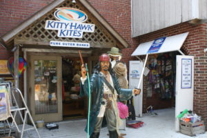 Kitty Hawk Kites store with a pirate out front