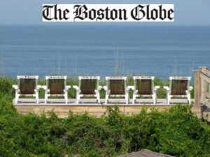Beach chairs aimed at the ocean for Boston Globe