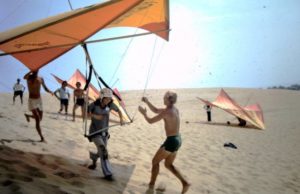 A hang glider enjoying the dunes in the early days of Kitty Hawk Kites