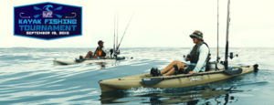 Two men in kayaks during the Kitty Hawk Surf Co fishing tournament
