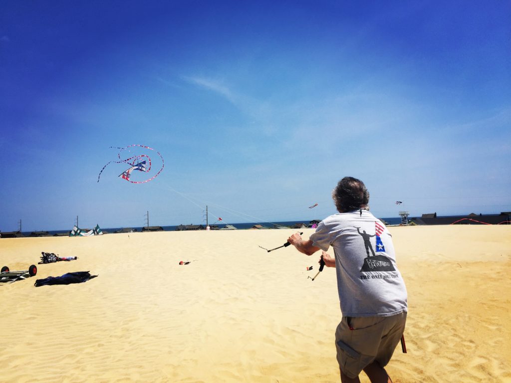 A stunt kite pilot flying his Revolution kite