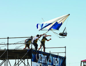 A team of people launching their flying contraption for Brewtag