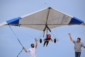 A hang gliding lesson for a child