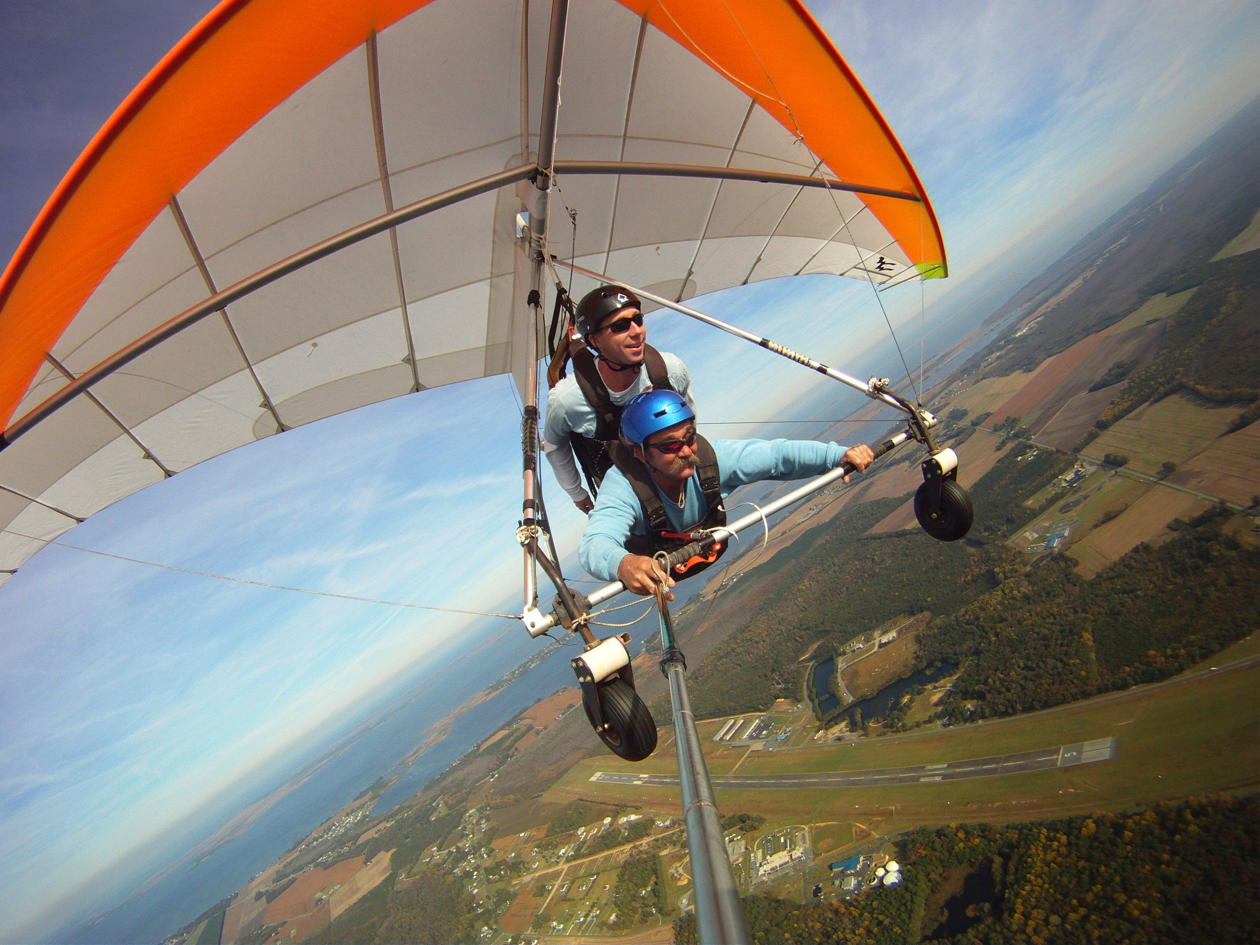 Hang glider pilot, Jonny Thompson flying a tandem hang glider
