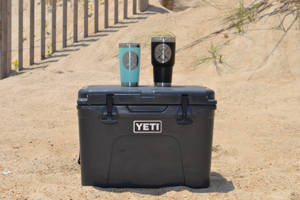 Yeti cooler and tumblers at the beach