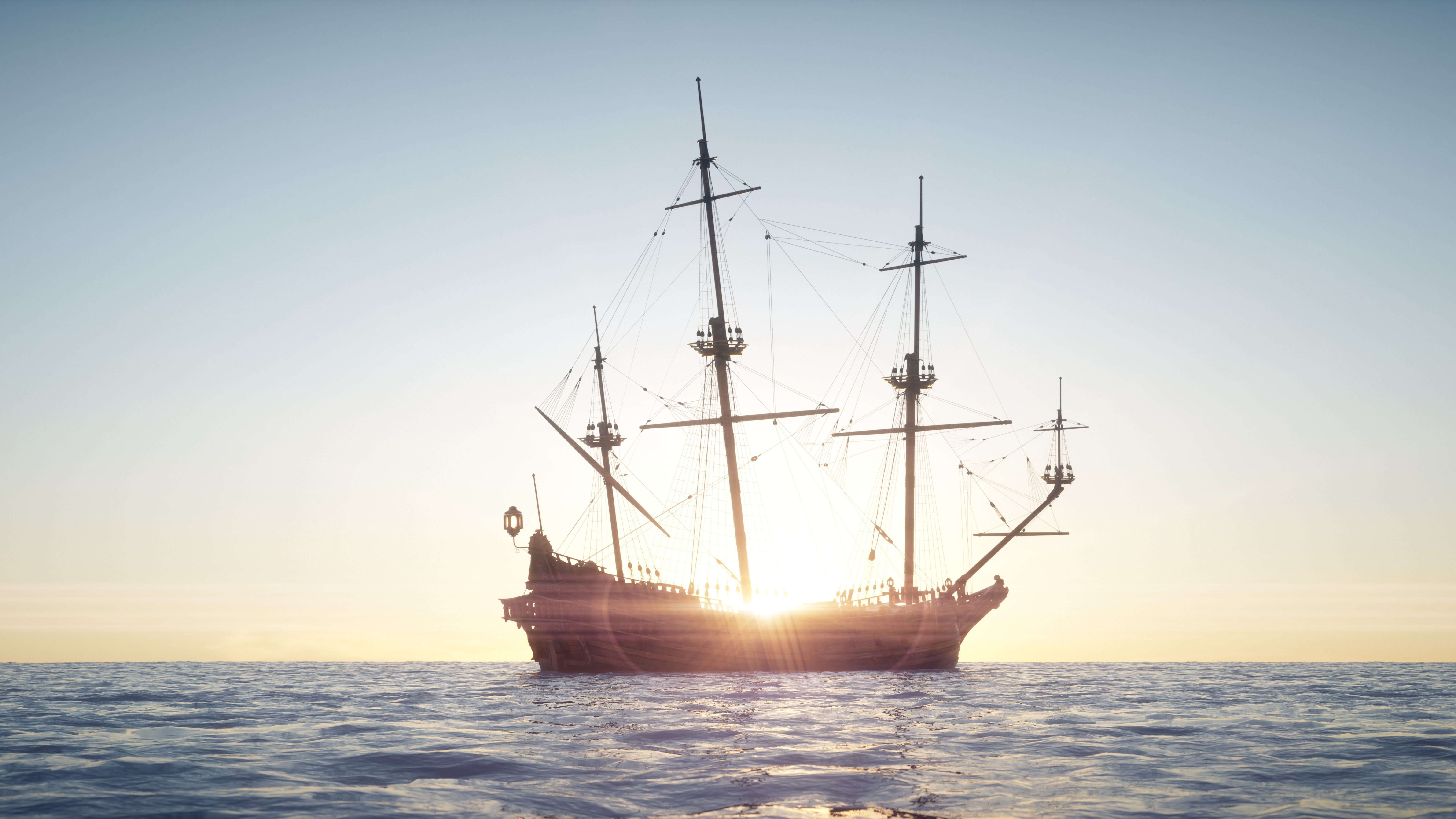 Pirate ship sailing against the sunset similar to Blackbeard's ship, Queen Anne's Revenge