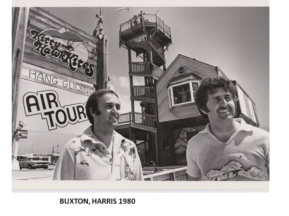 John Harris and Ralph Buxton stand in front of the newly constructed flagship Kitty Hawk Kites location in Nags Head, NC